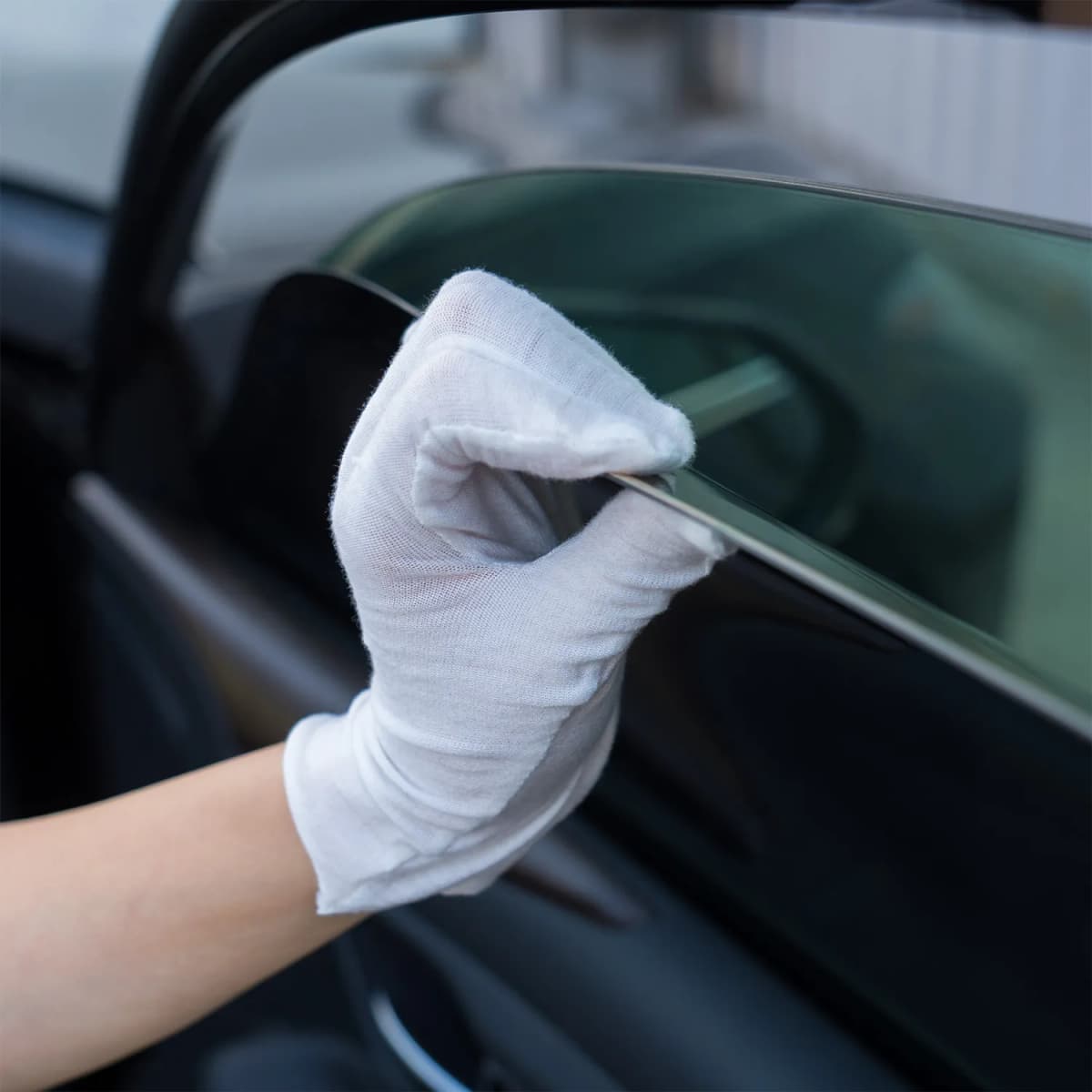 Peeling alignment tape from installed tint